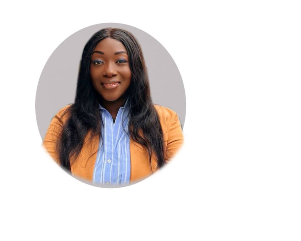 Professional woman smiling confidently in business attire.